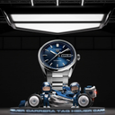 Stainless steel men's watch with blue dial, date display, racing car and drivers.